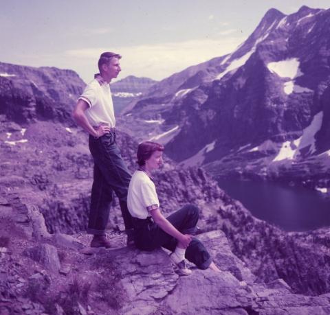 couple sitting on mountain