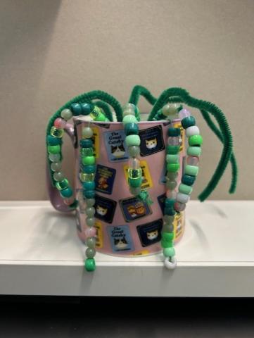 beaded plant in a mug