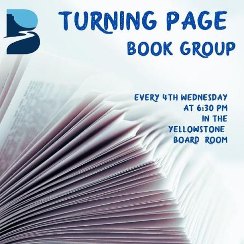 Turning Page Book Group.  A book lies open, its pages are fanned.